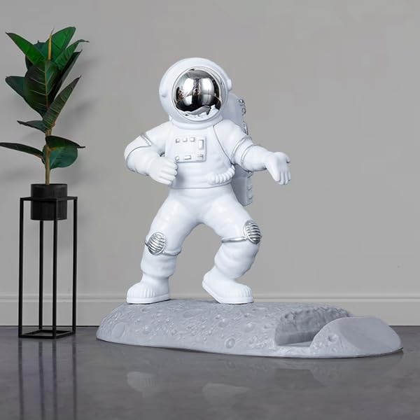 Street27Â® Astronaut Figurine Showpiece for Home DÃ©cor Idols for Office Desk Table, Creative Phone Stand Holder Desk Accessories Tabletop Statue for Gift Gifting Items Birthday Decoration (Silver-A)