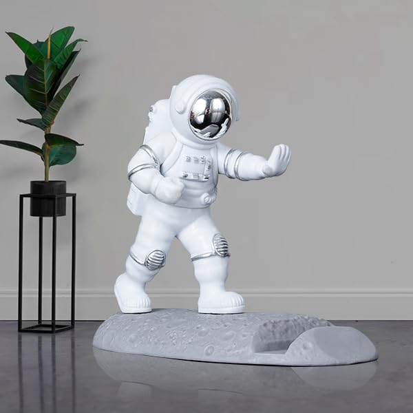 Street27Â® Astronaut Figurine Showpiece for Home DÃ©cor Idols for Office Desk Table, Creative Phone Stand Holder Desk Accessories Tabletop Statue for Gift Gifting Items Birthday Decoration (Silver-B)