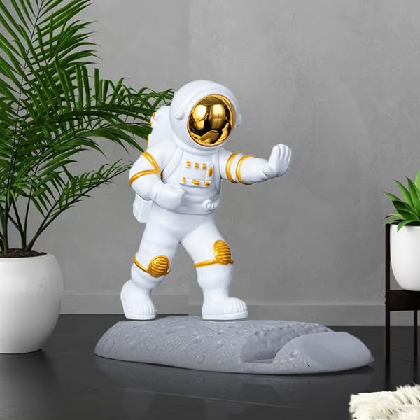 Street27Â® Astronaut Figurine Showpiece for Home DÃ©cor Idols for Office Desk Table, Creative Phone Stand Holder Desk Accessories Tabletop Statue for Gift Gifting Items Birthday Decoration (Golden-B)