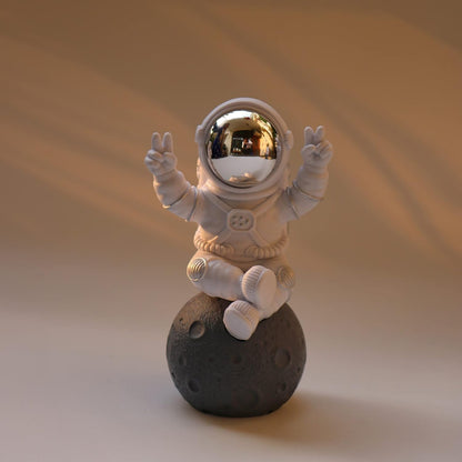 Street27® Astronaut Sitting on Moon Figurine for Home Décor - Silver