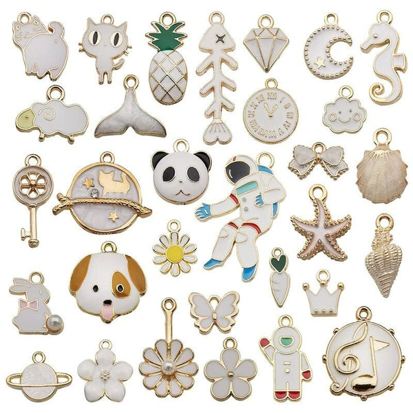 1 Set 31pcs DIY Mixed Assorted Gold Plated Enamel Charm Unicorn Flower Dress Fish Shell Moon Star Animals Pendant DIY for Necklace Bracelet Jewelry Making and Crafting (White)