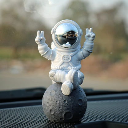 Street27® Astronaut Sitting on Moon Figurine for Home Décor - Silver