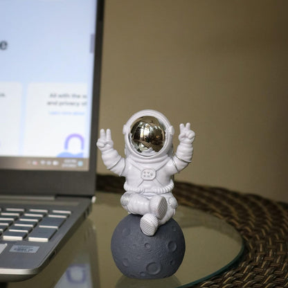 Street27® Astronaut Sitting on Moon Figurine for Home Décor - Silver